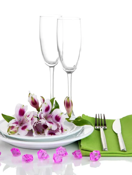Festive table setting with flowers isolated on white — Stock Photo, Image
