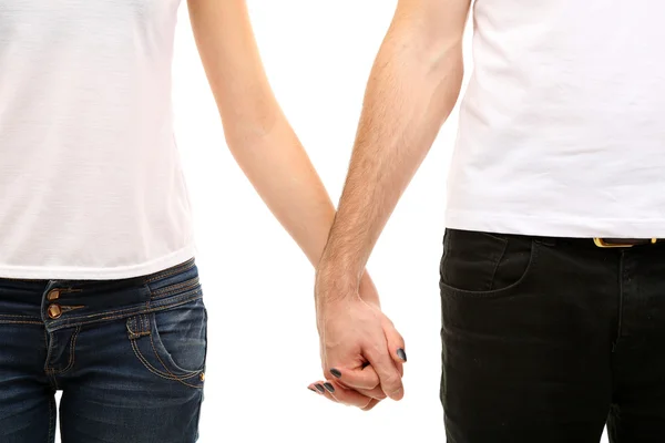 Jovem casal amoroso de mãos dadas isolado no branco — Fotografia de Stock