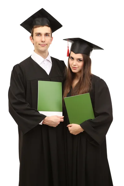 Dos estudiantes graduados felices con certificado de graduación aislado en blanco — Foto de Stock