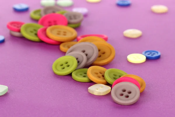 Jasny kolor przycisków na fioletowym tle — Zdjęcie stockowe