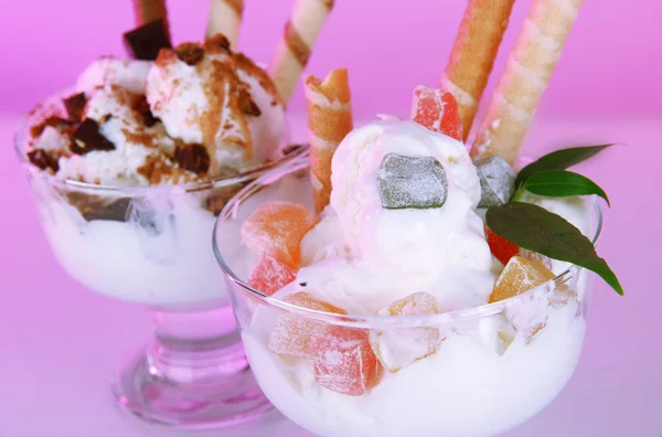 Ice cream with wafer sticks on pink background — Stock Photo, Image