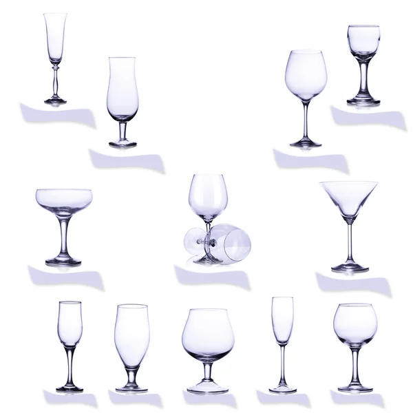 Collection of empty glasses isolated on white background — Stock Photo, Image