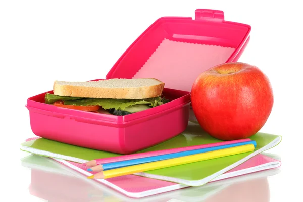 Boîte à lunch avec sandwich, pomme et papeterie isolée sur blanc — Photo