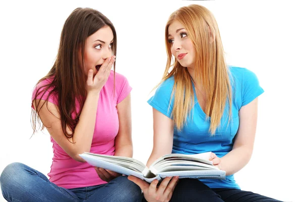 Two girl friends study isolated on white — Stock Photo, Image