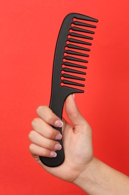 el renk arka plan üzerinde siyah tarak