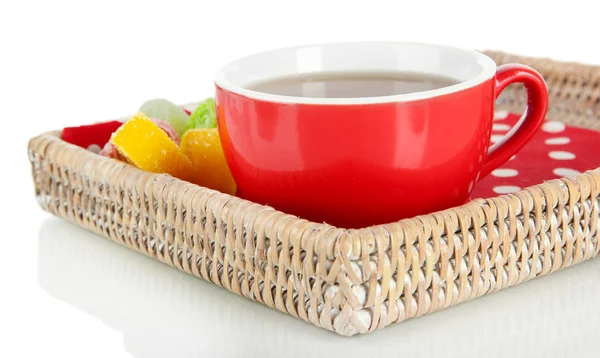 Cup of tea with candy on wooden tray isolated on white — Stock Photo, Image