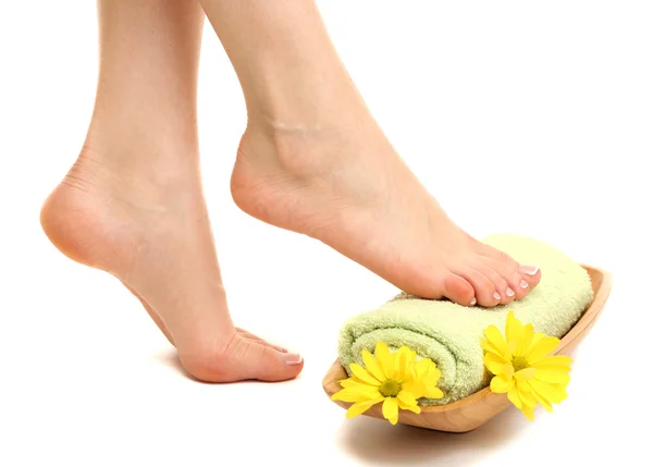 Female feet with towel - spa concept, isolated on white — Stock Photo, Image