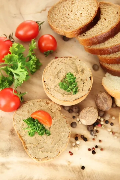 Fresh pate on wooden spoon, on wooden background — Stock Photo, Image