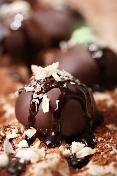 Chocolate candies with nuts, close up — Stock Photo, Image