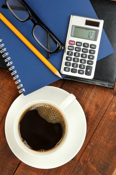 Cup of coffee on worktable close up — Stock Photo, Image