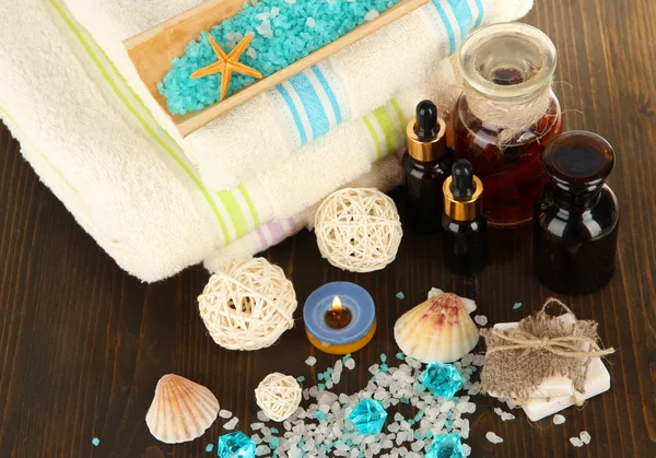 Sea spa elements on wooden table close up — Stock Photo, Image