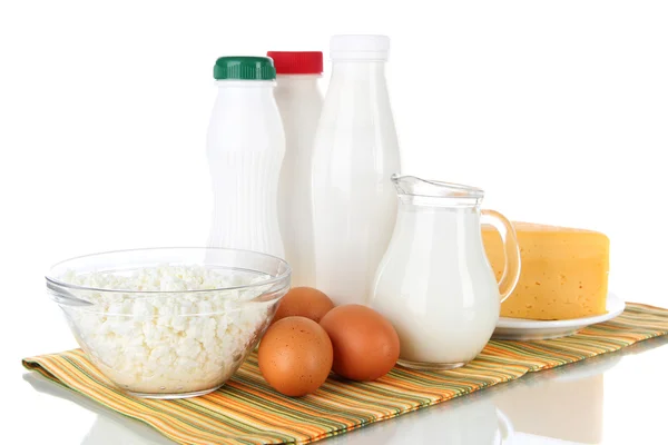 Dairy products and eggs on napkin isolated on white — Stock Photo, Image