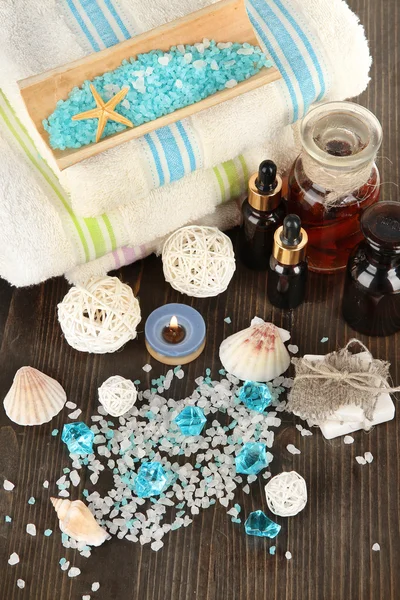 Sea spa elements on wooden table close up — Stock Photo, Image