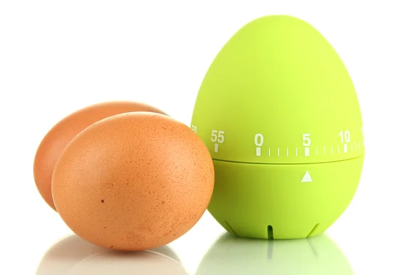 Zielony zegar jaj oraz jaj, na białym tle — Zdjęcie stockowe