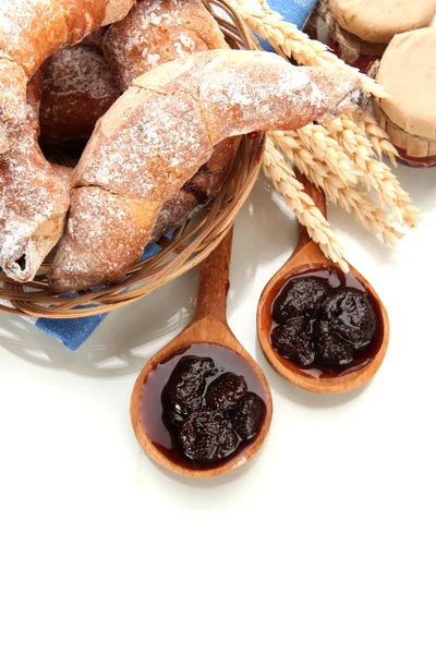 Taste croissants in basket and jam isolated on whit — Stock Photo, Image