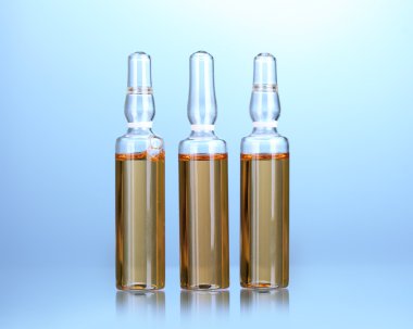 mavi arka plan üzerinde tıbbi ampul