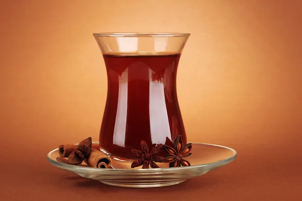 Glass of Turkish tea, on brown background — Stock Photo, Image