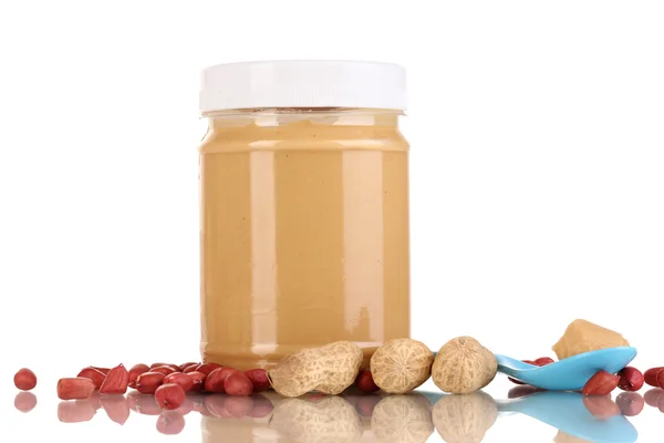 Delicious peanut butter in jar isolated on white — Stock Photo, Image