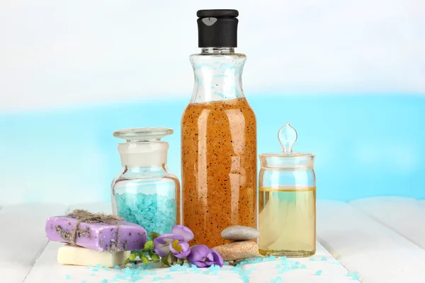 Beautiful spa setting on white wooden table on sky background — Stock Photo, Image