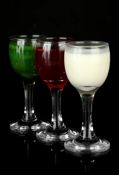 Tasty color liquors, isolated on black — Stock Photo, Image