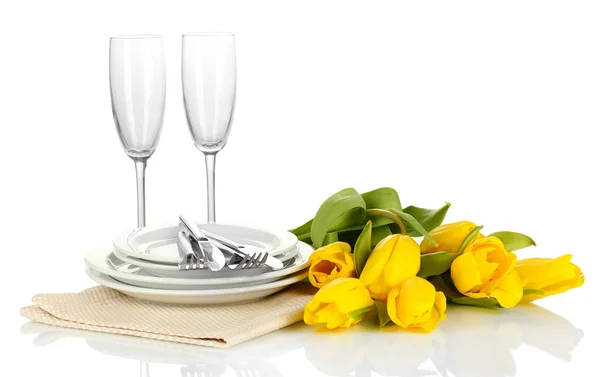 Yellow tulips and utensils for serving isolated on white — Stock Photo, Image