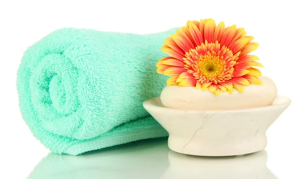 Rolled towel, soap bar and beautiful flower isolated on white — Stock Photo, Image