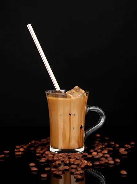 Cold coffee with ice in glass isolated on black — Stock Photo, Image