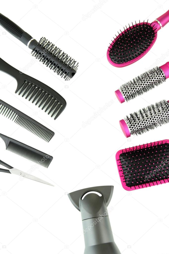 Comb brushes, hairdryer and cutting shears, isolated on white