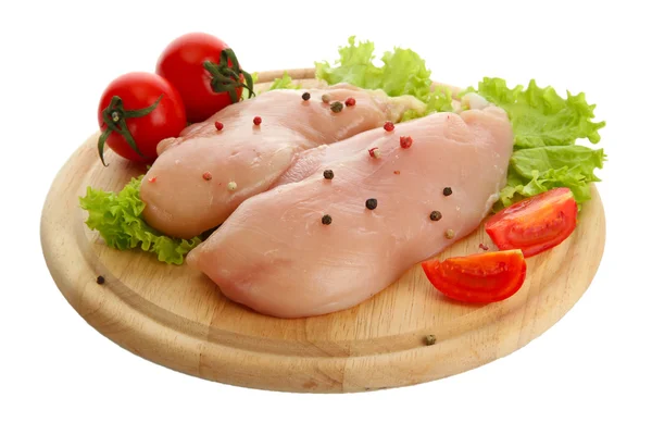 Raw chicken meat on cutting board, isolated on white — Stock Photo, Image