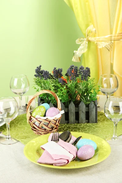 Easter table setting on color background — Stock Photo, Image