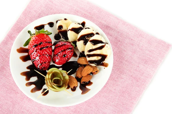 Fruit in chocolate on a napkin — Stock Photo, Image