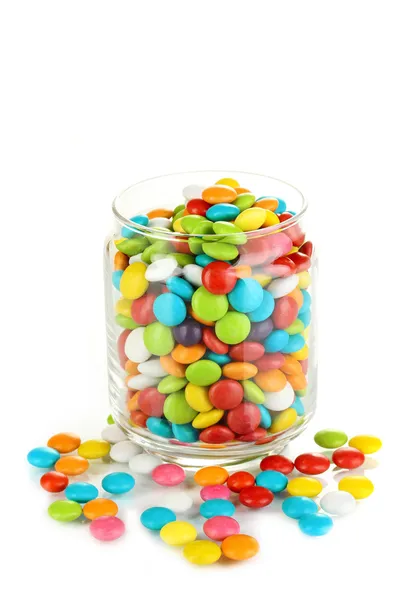 Coloridos caramelos en tarro de vidrio aislado en blanco —  Fotos de Stock