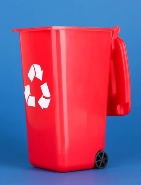 Recycling bin on blue background — Stock Photo, Image