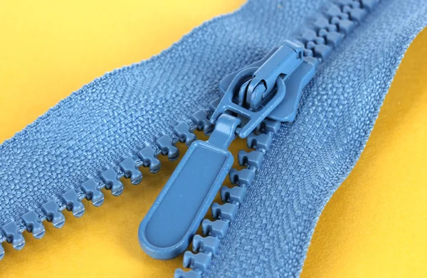 Zipper on yellow background — Stock Photo, Image