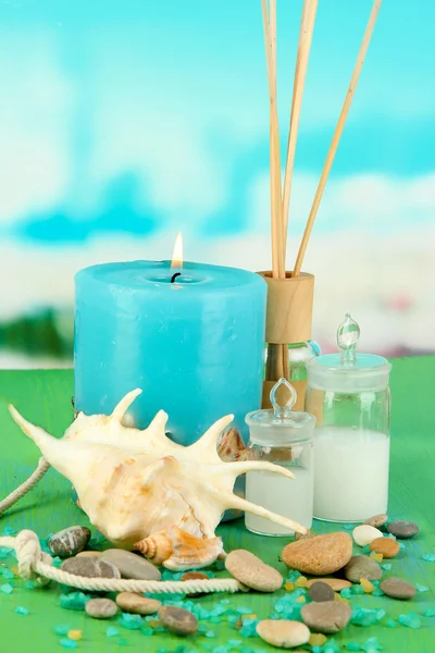 Sea spa composition on wooden table on blue natural background — Stock Photo, Image