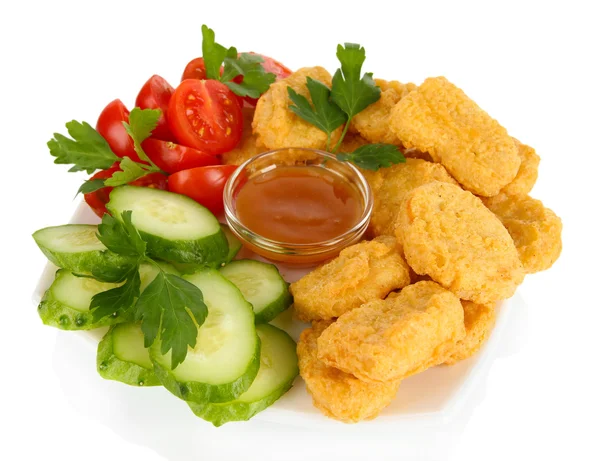 Fried chicken nuggets with vegetables and sauce isolated on white — Stock Photo, Image