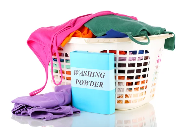 Clothes with washing powder in plastic basket isolated on white — Stock Photo, Image