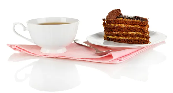 A cup of tea and delicious cake isolated on white — Stock Photo, Image