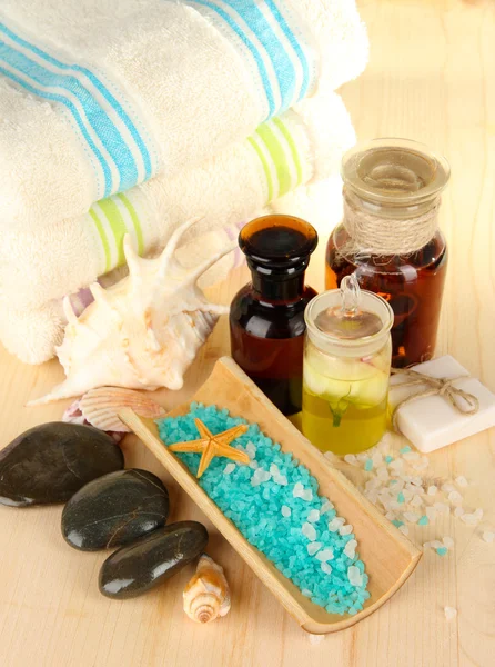 Sea spa elements on wooden table close up — Stock Photo, Image