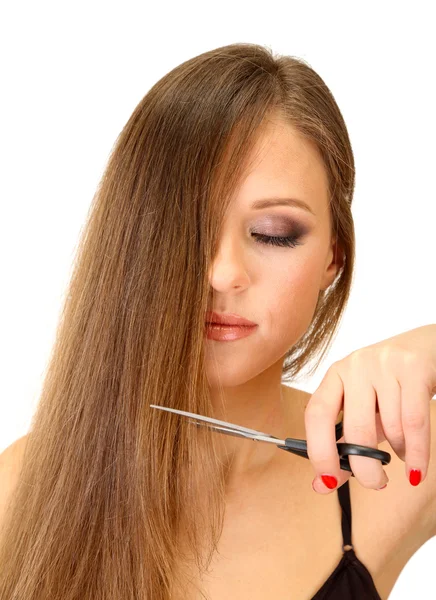 Krásná žena s dlouhými vlasy a Kadeřnické nůžky, izolované na bílém — Stock fotografie