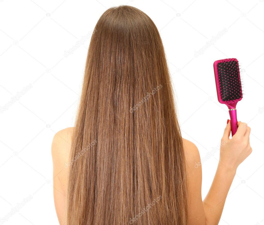 Portrait of beautiful woman with long hair and a hairbrush, isolated on white