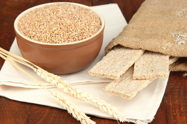 Wheat bran on the table — Stock Photo, Image