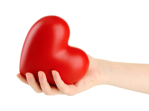 Corazón rojo en la mano de la mujer, aislado en blanco — Foto de Stock