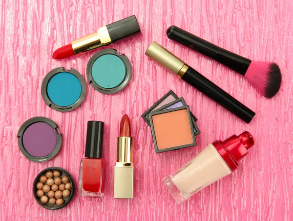 Decorative cosmetics on pink background — Stock Photo, Image