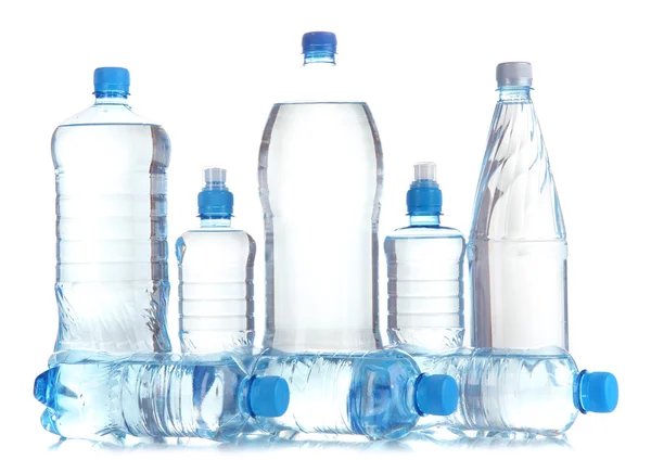 Diferentes botellas de agua aisladas en blanco —  Fotos de Stock