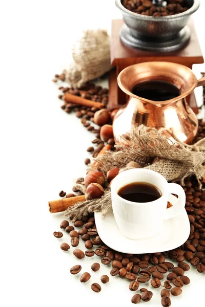 Cup and pot of coffee and coffee beans, isolated on white — Stock Photo, Image