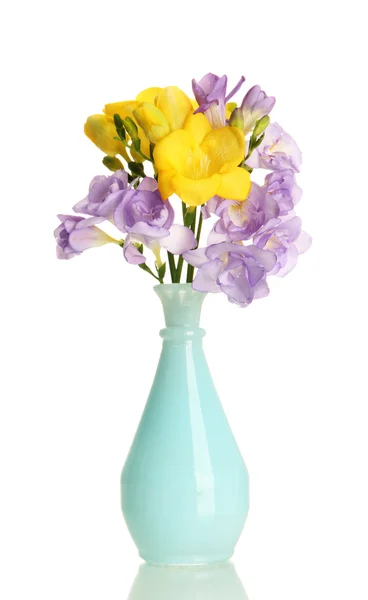Beautiful bouquet of freesias in vase, isolated on white — Stock Photo, Image