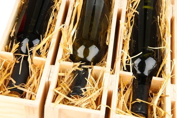 Wooden case with wine bottles close up — Stock Photo, Image