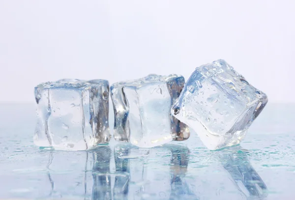 Ice on light background — Stock Photo, Image