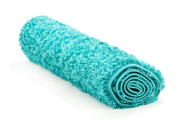 Warmgewalste kleur tapijt geïsoleerd op wit — Stockfoto
